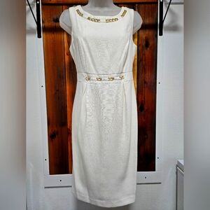 Elegant White Sleeveless Dress with Gold Accents